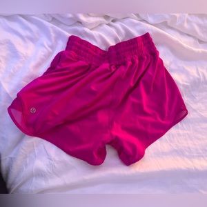 Lulu Lemon hotty hot shorts, High rise. Size 4, 4 Inch. Sonic pink.
